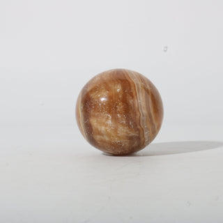 Golden Calcite Sphere from The Rock Space