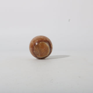 Golden Calcite Sphere from The Rock Space