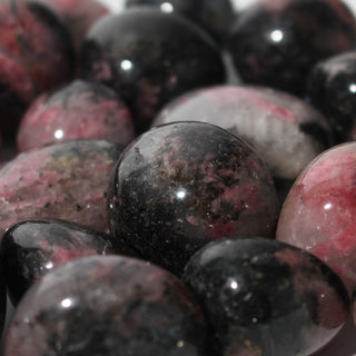 Rhodonite Dark Tumbled Stones from The Rock Space