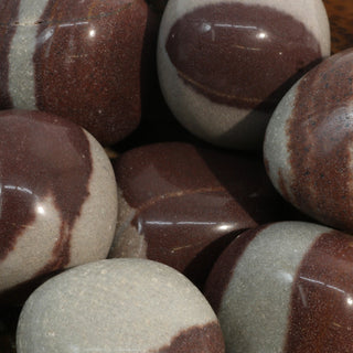 Narmada Shiva Lingam Tumbles Stone    from Stonebridge Imports