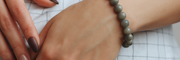 Labradorite bead bracelet worn on a wrist
