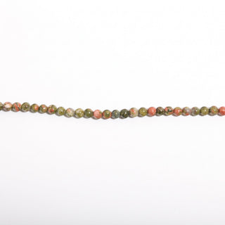 Unakite Bead Strand — BE4UNA, new photo on a clean white background. Stonebridge Imports.