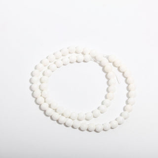 Tridacna Bead Strand — BE69751, new photo on a clean white background. Stonebridge Imports.