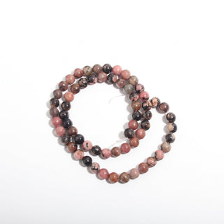 Rhodochrosite Bead Strand — BE6SDC38638, new photo on a clean white background. Stonebridge Imports.