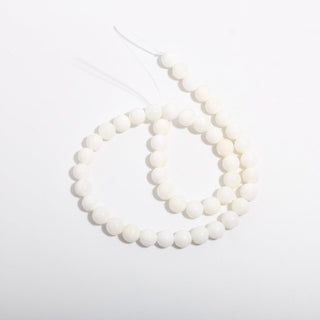 Tridacna Bead Strand — BE89751, new photo on a clean white background. Stonebridge Imports.