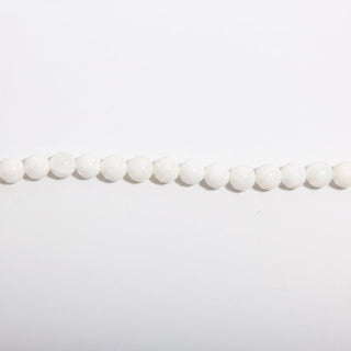 Tridacna Bead Strand — BE89751, new photo on a clean white background. Stonebridge Imports.