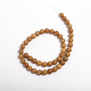 Wood Jasper Bead Strand, new photo on a clean white background. Stonebridge Imports.