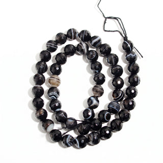 Black Agate With White Stripe Faceted - Round Strand 15" - 8mm (Enhanced), new photo on a clean white background. Stonebridge Imports.