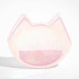 Rose Quartz Aura-Plated Cat Head Bowl, a small pink aura-plated quartz dish carved with pointed cat ears and an iridescent rim, photographed on a clean white background. Stonebridge Imports.