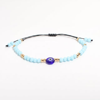 Evil Eye Bracelet with Coloured Beads and Cord - Adjustable Light Blue and Gold from Stonebridge Imports