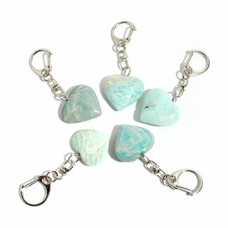 Amazonite Heart Charm - Pack of 5 - five polished turquoise amazonite hearts, each on its own silver-tone swivel clasp, arranged on a clean white background. Stonebridge Imports.