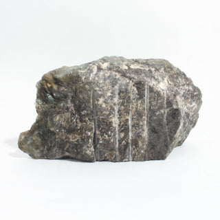 Labradorite Polished Face Cut Base Unique #1 seen from the back, showing the natural pale grey unpolished rock and saw-cut grooves, on a clean white background. Stonebridge Imports.