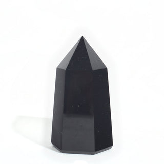 Black Obsidian Generator Unique #12 — polished six-sided tower with a faceted point, seen from a second angle, photographed on a clean white background. Stonebridge Imports.