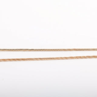 Gold Plated Zodiac Necklace — close-up of the fine gold snake chain, photographed on a clean white background. Stonebridge Imports.