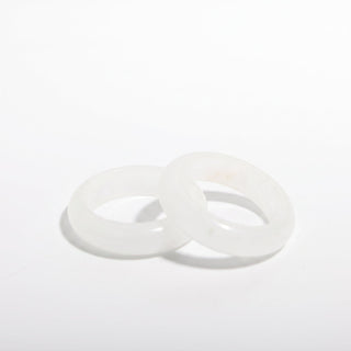 Clear Quartz Ring — solid clear quartz stone band ring, photographed on a clean white background. Stonebridge Imports.