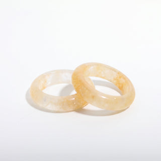 Golden Healer Ring — solid pale golden healer quartz stone band ring, photographed on a clean white background. Stonebridge Imports.