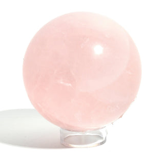 Rose Quartz Sphere Unique #192 turned to show fine white internal wisps through the translucent pink quartz, on a clean white background. Stonebridge Imports.