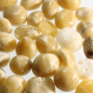 Amber Aragonite Tumbled Stones from The Rock Space