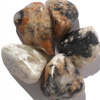 Cassiterite In Quartz Tumbled Stones    from The Rock Space