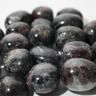 Garnet with Astrophyllite Tumbled Stones from Stonebridge Imports