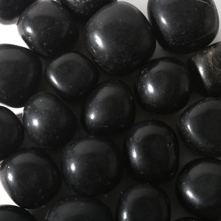 Black Obsidian Tumbled Stones - India    from Stonebridge Imports