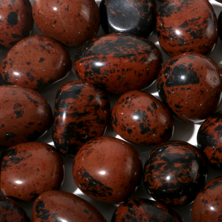 Obsidian Mahogany Tumbled Stones    from Stonebridge Imports