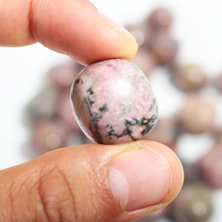 Rhodonite Dark Tumbled Stones from Stonebridge Imports