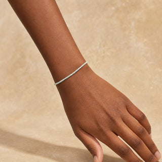 Amazonite bead bracelet worn on the wrist, close-up