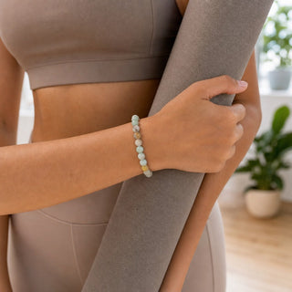Mixed Amazonite bead bracelet worn while carrying a yoga mat