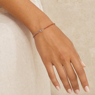 Brown Goldstone bead bracelet worn on the wrist, close-up