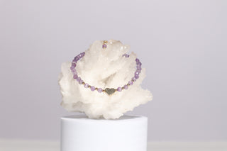 bracelet on top of white calcite 