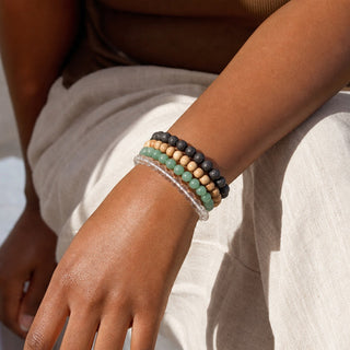 Green Aventurine bead bracelet stacked with other bead bracelets on the wrist