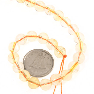 Citrine A Round Strand 7" - 6mm (Enhanced) from Stonebridge Imports