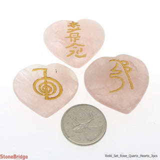 Rose Quartz Reiki Hearts engraved with symbols - 1" to 1 1/2"    from The Rock Space