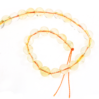 Citrine A Round Strand 7" - 6mm (Enhanced) from Stonebridge Imports