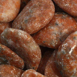 Orange Calcite Tumbled Stones - Brazil    from Stonebridge Imports