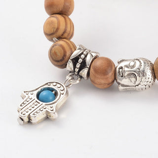 Wood Bead Bracelet with Buddha and Hamsa Charm    from The Rock Space