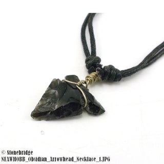 Obsidian Arrowhead Necklace - wire wrapped and in leather cord    from The Rock Space