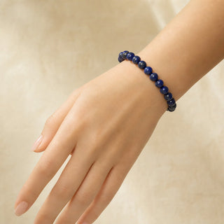 Lapis Lazuli bead bracelet worn on the wrist, close-up
