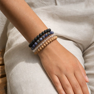 Sodalite bead bracelet stacked with other bead bracelets on the wrist