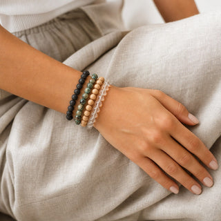 African Turquoise bead bracelet stacked with other bead bracelets on the wrist