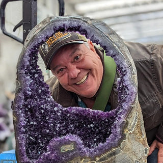 ulymar with his face inside amethyst geode