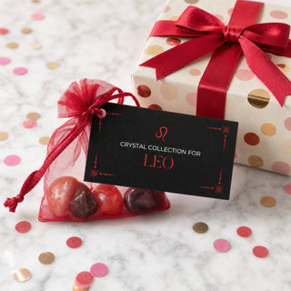 Zodiac Crystal Collection Leo kit beside a wrapped birthday present